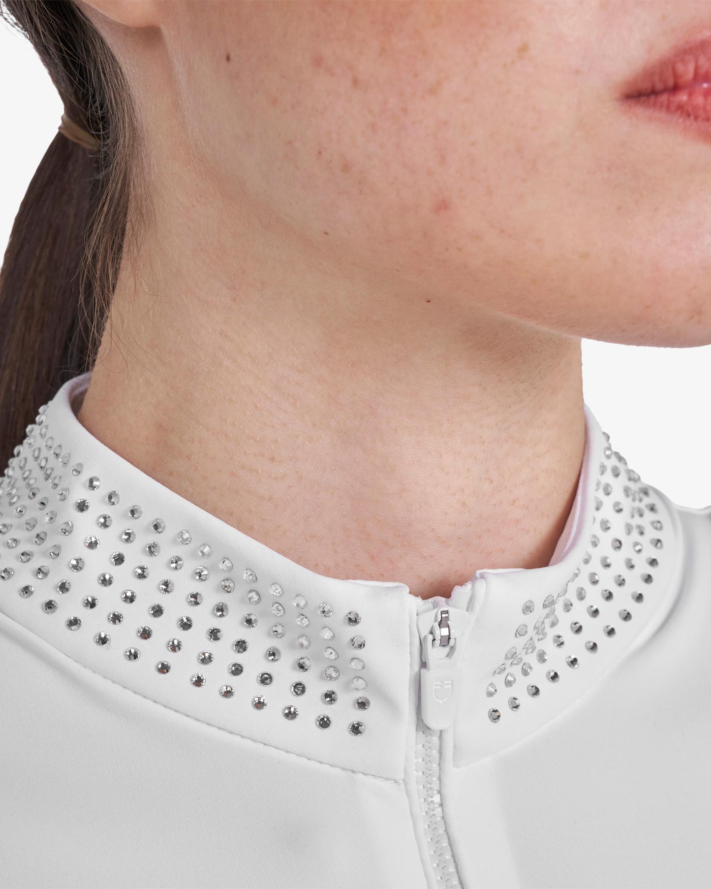 Polo training donna slim fit con zip e strass sul colletto 2026